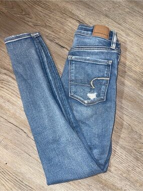 American Eagle Outfitters Mid Blue Skinny Jeans with Back Pocket Detail